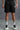 Signature Black Trackline Shorts - BonkersCorner